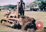 Image of Digging air raid shelters in Hawaii at start of World War II Hawaii USA, 1942, second 13 stock footage video 65675062971