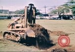 Image of Digging air raid shelters in Hawaii at start of World War II Hawaii USA, 1942, second 14 stock footage video 65675062971