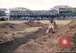 Image of Digging air raid shelters in Hawaii at start of World War II Hawaii USA, 1942, second 51 stock footage video 65675062971