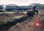 Image of Digging air raid shelters in Hawaii at start of World War II Hawaii USA, 1942, second 58 stock footage video 65675062971