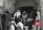 Image of Annual pilgrimage to Nabi Musa (Tomb of Prophet Moses) Palestine, 1945, second 24 stock footage video 65675062974