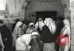 Image of Annual pilgrimage to Nabi Musa (Tomb of Prophet Moses) Palestine, 1945, second 32 stock footage video 65675062974