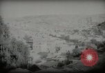 Standbild kleiner Junge zu Fuß und mit Kamelen Amman Transjordan, 1945, aus Sekunde 30 historischem Filmmaterial Videoclip 65675062976