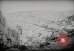 Standbild kleiner Junge zu Fuß und mit Kamelen Amman Transjordan, 1945, aus Sekunde 34 historischem Filmmaterial Videoclip 65675062976