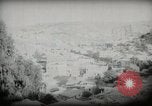 Standbild kleiner Junge zu Fuß und mit Kamelen Amman Transjordan, 1945, aus Sekunde 35 historischem Filmmaterial Videoclip 65675062976