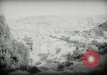 Standbild kleiner Junge zu Fuß und mit Kamelen Amman Transjordan, 1945, aus Sekunde 42 historischem Filmmaterial Videoclip 65675062976