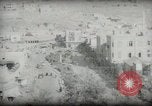 Standbild kleiner Junge zu Fuß und mit Kamelen Amman Transjordan, 1945, aus Sekunde 46 historischem Filmmaterial Videoclip 65675062976