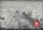 Standbild kleiner Junge zu Fuß und mit Kamelen Amman Transjordan, 1945, aus Sekunde 48 historischem Filmmaterial Videoclip 65675062976
