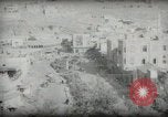Standbild kleiner Junge zu Fuß und mit Kamelen Amman Transjordan, 1945, aus Sekunde 49 historischem Filmmaterial Videoclip 65675062976