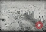 Standbild kleiner Junge zu Fuß und mit Kamelen Amman Transjordan, 1945, aus Sekunde 50 historischem Filmmaterial Videoclip 65675062976