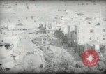 Standbild kleiner Junge zu Fuß und mit Kamelen Amman Transjordan, 1945, aus Sekunde 54 historischem Filmmaterial Videoclip 65675062976