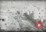 Standbild kleiner Junge zu Fuß und mit Kamelen Amman Transjordan, 1945, aus Sekunde 55 historischem Filmmaterial Videoclip 65675062976