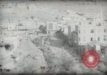 Standbild kleiner Junge zu Fuß und mit Kamelen Amman Transjordan, 1945, aus Sekunde 56 historischem Filmmaterial Videoclip 65675062976