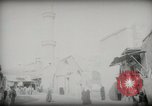 Standbild kleiner Junge zu Fuß und mit Kamelen Amman Transjordan, 1945, aus Sekunde 59 historischem Filmmaterial Videoclip 65675062976