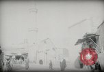 Standbild kleiner Junge zu Fuß und mit Kamelen Amman Transjordan, 1945, aus Sekunde 60 historischem Filmmaterial Videoclip 65675062976