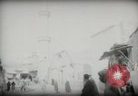 Standbild kleiner Junge zu Fuß und mit Kamelen Amman Transjordan, 1945, aus Sekunde 62 historischem Filmmaterial Videoclip 65675062976