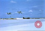 Image of Japanese planes bombing Midway Island in World War II Midway Island, 1942, second 39 stock footage video 65675063019