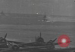 Image of USS Enterprise (CV-6) battling Japanese warplanes Pacific Ocean, 1942, second 3 stock footage video 65675063020