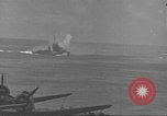 Image of USS Enterprise (CV-6) battling Japanese warplanes Pacific Ocean, 1942, second 12 stock footage video 65675063020