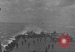 Image of USS Enterprise (CV-6) battling Japanese warplanes Pacific Ocean, 1942, second 20 stock footage video 65675063020