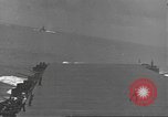 Image of USS Enterprise (CV-6) battling Japanese warplanes Pacific Ocean, 1942, second 36 stock footage video 65675063020