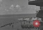 Image of USS Enterprise (CV-6) battling Japanese warplanes Pacific Ocean, 1942, second 51 stock footage video 65675063020