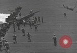 Image of USS Enterprise (CV-6) battling Japanese warplanes Pacific Ocean, 1942, second 53 stock footage video 65675063020