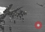 Image of USS Enterprise (CV-6) battling Japanese warplanes Pacific Ocean, 1942, second 57 stock footage video 65675063020