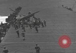 Image of USS Enterprise (CV-6) battling Japanese warplanes Pacific Ocean, 1942, second 61 stock footage video 65675063020