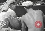 Standbild United States Navy crew Pearl Harbor Hawaii USA, 1942, aus Sekunde 34 historischem Filmmaterial Videoclip 65675063059