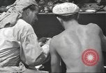 Standbild United States Navy crew Pearl Harbor Hawaii USA, 1942, aus Sekunde 35 historischem Filmmaterial Videoclip 65675063059