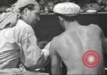 Standbild United States Navy crew Pearl Harbor Hawaii USA, 1942, aus Sekunde 37 historischem Filmmaterial Videoclip 65675063059