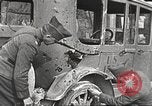 Image of US soldiers examine gunfire damaged car France, 1917, second 5 stock footage video 65675063072