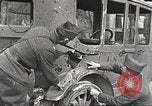 Image of US soldiers examine gunfire damaged car France, 1917, second 8 stock footage video 65675063072