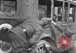 Image of US soldiers examine gunfire damaged car France, 1917, second 10 stock footage video 65675063072
