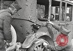 Image of US soldiers examine gunfire damaged car France, 1917, second 11 stock footage video 65675063072