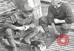 Image of US soldiers examine gunfire damaged car France, 1917, second 14 stock footage video 65675063072