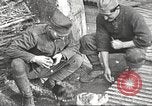 Image of US soldiers examine gunfire damaged car France, 1917, second 15 stock footage video 65675063072