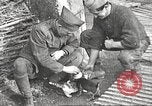 Image of US soldiers examine gunfire damaged car France, 1917, second 19 stock footage video 65675063072
