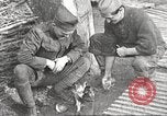 Image of US soldiers examine gunfire damaged car France, 1917, second 21 stock footage video 65675063072