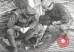 Image of US soldiers examine gunfire damaged car France, 1917, second 22 stock footage video 65675063072