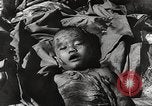 Image of victims of Nazi and Japanese atrocities in World War 2 Europe, 1945, second 13 stock footage video 65675063143