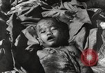 Image of victims of Nazi and Japanese atrocities in World War 2 Europe, 1945, second 14 stock footage video 65675063143