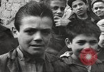 Image of European children and adults scavenge for food and relief after war Europe, 1945, second 4 stock footage video 65675063144