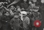 Image of European children and adults scavenge for food and relief after war Europe, 1945, second 5 stock footage video 65675063144