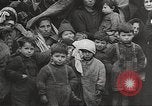 Image of European children and adults scavenge for food and relief after war Europe, 1945, second 6 stock footage video 65675063144