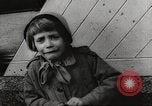 Image of European children and adults scavenge for food and relief after war Europe, 1945, second 7 stock footage video 65675063144