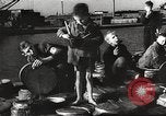 Image of European children and adults scavenge for food and relief after war Europe, 1945, second 26 stock footage video 65675063144