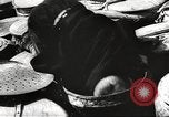 Image of European children and adults scavenge for food and relief after war Europe, 1945, second 30 stock footage video 65675063144