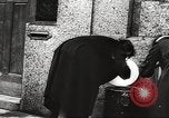 Image of European children and adults scavenge for food and relief after war Europe, 1945, second 32 stock footage video 65675063144